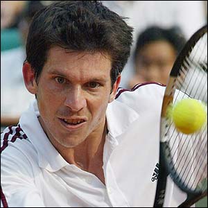 Henman focuses on a volley