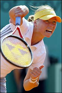 Russia's Vera Zvonareva in action against Venus Williams