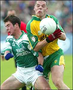 Donegal's Kevin Cassidy evades Ryan Keenan 