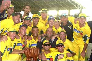 Australia celebrate a 4-3 series win despite losing the seventh and final match