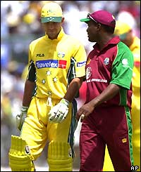 Opposing captains Ricky Ponting and Brian Lara chat out in the middle