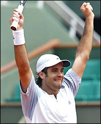 Chilean Fernando Gonzalez celebrates reaching his first Grand Slam quarter-final 