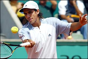 Mariano Zabaleta of Argentina hits a forehand