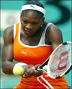 Serena Williams hits a two-handed shot