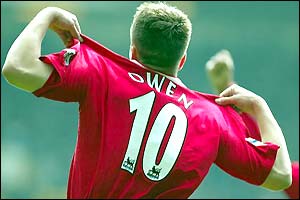 Michael Owen celebrates his strike against Everton