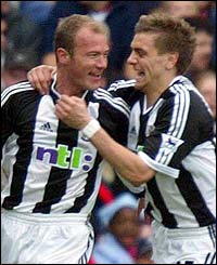 Alan Shearer and Jonathan Woodgate celebrate Shearer's 25th goal of the season 