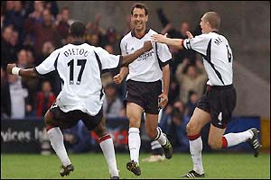 Sylvain Legwinski (centre) equalises for Fulham