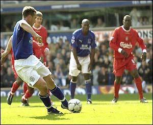 David Unsworth hammers home a penalty against Liverpool