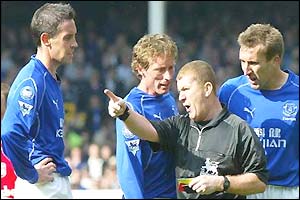 David Weir of Everton is sent off by referee Paul Durkin