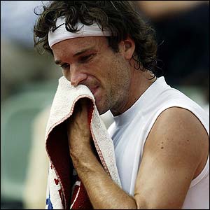 Carlos Moya tries to gather himself as he loses first two sets to Martin Verkerk in their quarter-final match 