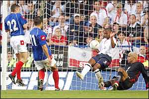 Nenad Jestrovic scores Serbia & Montenegro's equaliser