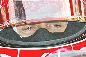 Michael Schumacher awaits the start of the race in his Ferrari