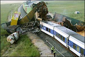 Wrecked coaches piled on top of each other