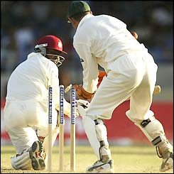 Brian Lara is bowled behind his legs by a full toss from Brad Hogg