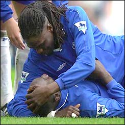 Mario Melchoit congratulates Jimmy Floyd Hasselbaink on his goal