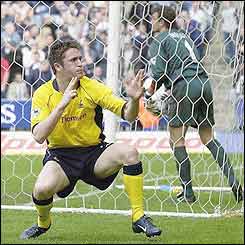 Robbie Keane celebrates scoring the winner against West Brom