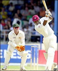 Marlon Samuels hits out on his way to scoring a half-century