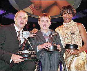 Tanni is flanked by Sir Steve Redgrave and Denise Lewis at the 2000 BBC Sports Personality Awards