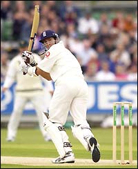 Michael Vaughan of England clips a ball off his legs