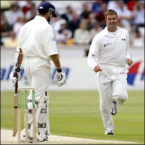 Michael Vaughan is dismissed by Zimbabwe captain Heath Streak