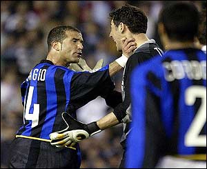 Inter's Luigi di Bagio argues with his team-mate Francesco Toldo