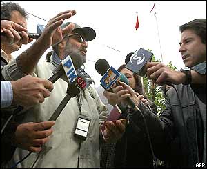 Turkish-Cypriot Hasan Palie talks to media