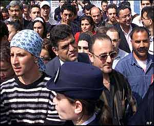 Crowds flock across border