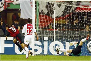 Inzaghi (left) wheels away to celebrate after scoring Milan's opener