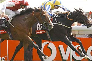 Kevin Darley takes the Vodafone Woodcote Stakes on Parkview Love after a close finish 