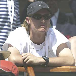 Lleyton Hewitt, the men's world number one, watches girlfriend Kim Clijsters play in the women's final