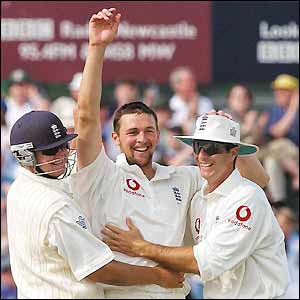Robert Key, Steve Harmison and Michael Vaughan celebrate victory against Zimbabwe