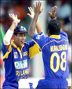 Dilshan and Muralitharan celebrate the wicket of Bernard