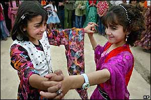 Children dance in Kirkuk school playground