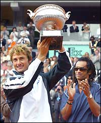 Juan Carlos Ferrero plays a forehand