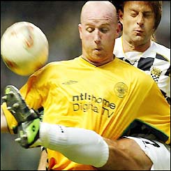 John Hartson is surrounded by the Boavista defence