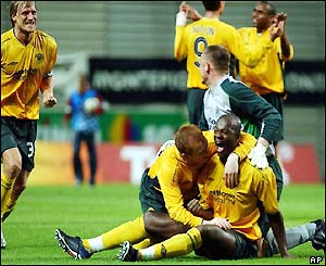 The Celtic players celebrate their win at the final whistle