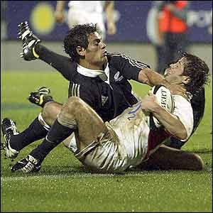 Andy Gomarsall dives over the line to score England's second try of the match