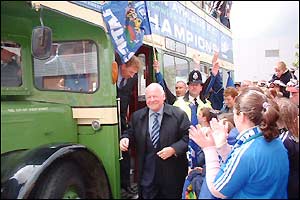 Wigan and their fans celebrate promotion to Division One with a victory bus parade