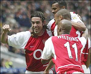 Robert Pires (left) celebrates his goal against Bolton