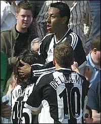 Nolberto Solano is congratulated on his goal