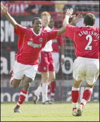 Kevin Lisbie (left) celebrates his goal against Southampton
