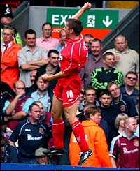 Michael Owen celebrates scoring his first goal against West Ham on 18 August 2001