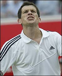 Henman shows his relief after sealing the win against Sanguinetti after a tie-break