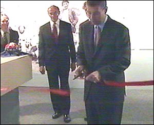 Prince Andrew cutting a ribbon at the Everest Exhibition at the Reghed Visitors' Centre
