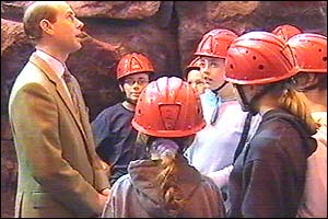 The Earl of Wessex chatting to children in hard hats 