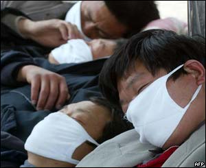 Migrant workers at a Beijing railway station