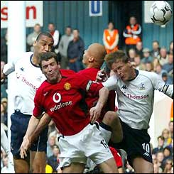 Dean Richards heads the ball wide