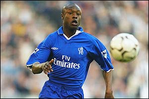 Chelsea defender William Gallas goes for the ball