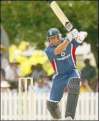 Adam Hollioake hits out for England during a one-day match in Australia