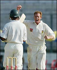 Shaun Pollock celebrates taking the wicket of a Bangladeshi batsman